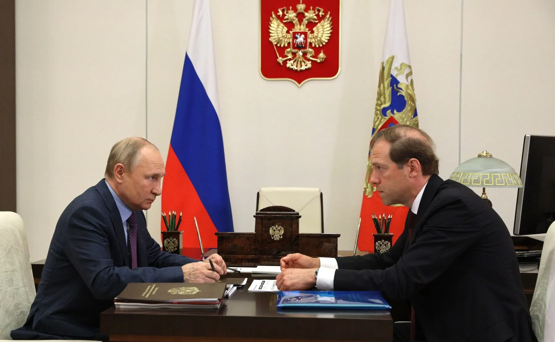 Putin at a working meeting with Industry and Trade Minister Manturov, June 10, 2021 — months before the rhetoric turned. Photo: Presidential Press and Information Office. Licence: CC BY 4.0 (attribution to Kremlin.ru required). Source: Wikimedia Commons